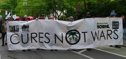Cures Not Wars banner at a drug policy reform demonstration